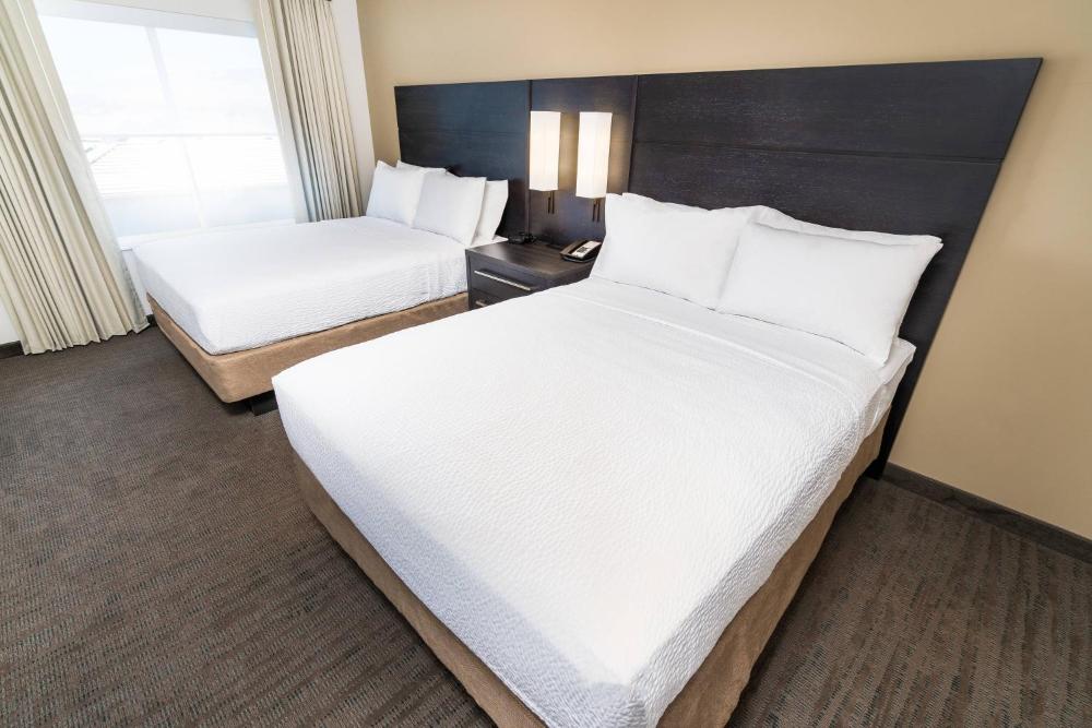 One-Bedroom Suite with Two Queen Beds and Sofa Bed interior